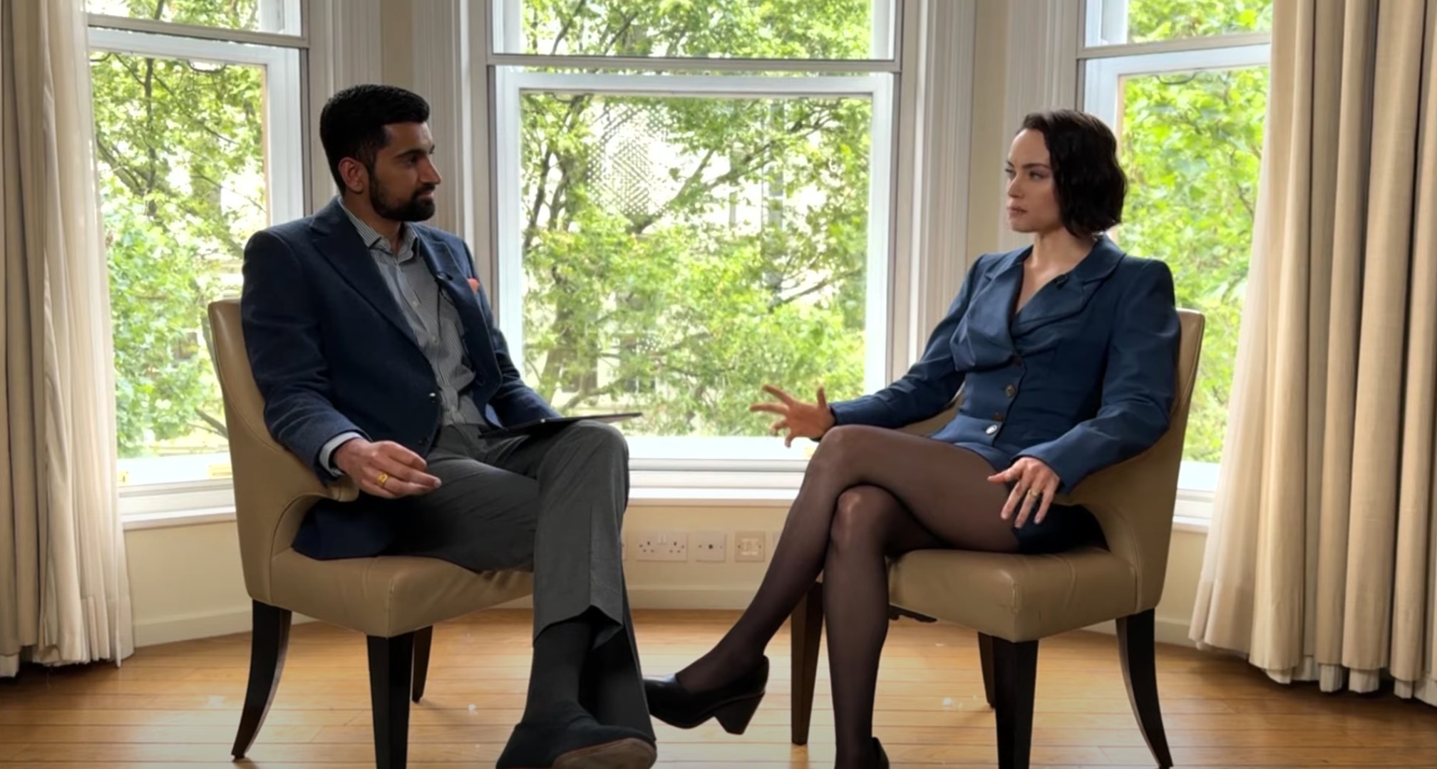 Daisy Ridley ITV interview blue skirt and stockings 3