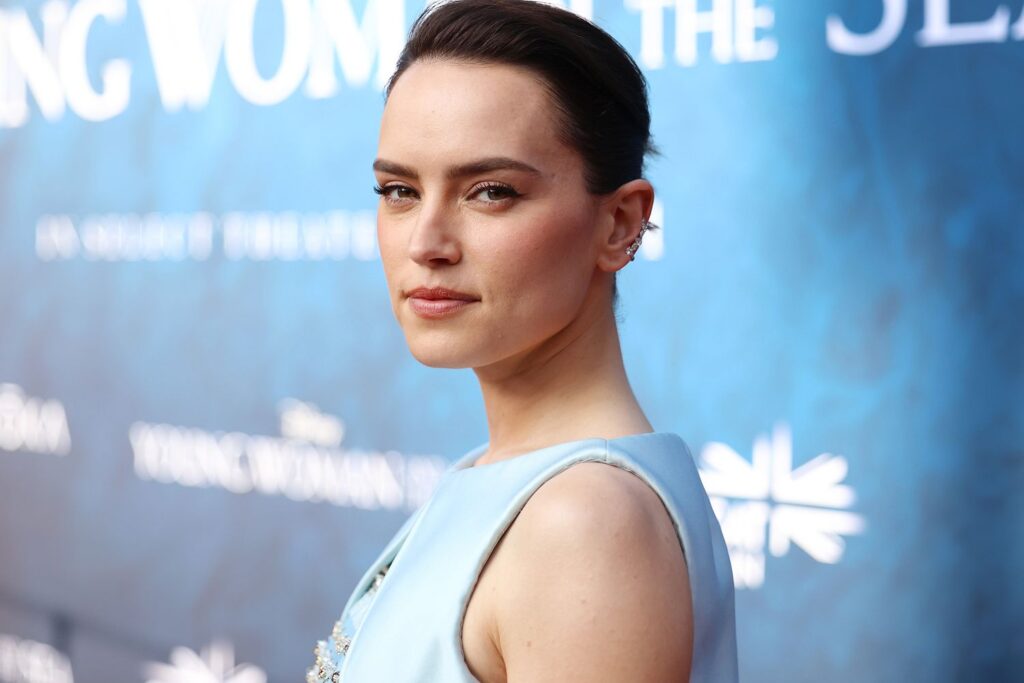 Daisy Ridley looking at camera