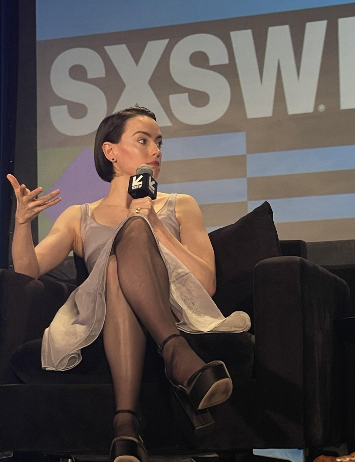 Daisy Ridley sexy stockings and skirt 2